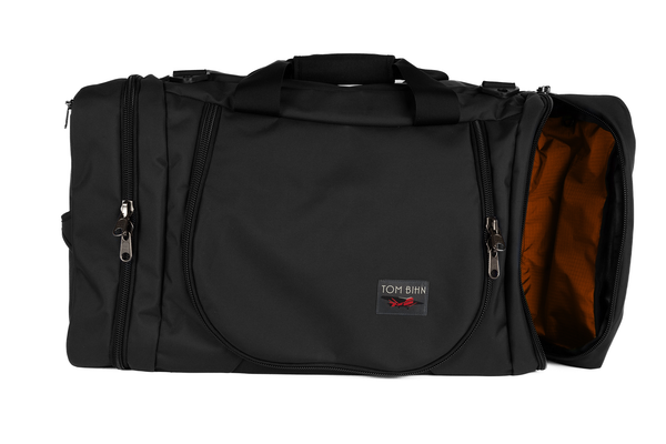 A Black Ballistic Aeronaut 45 with the end pocket open showing the Persimmon (dark orange) Cerylon.